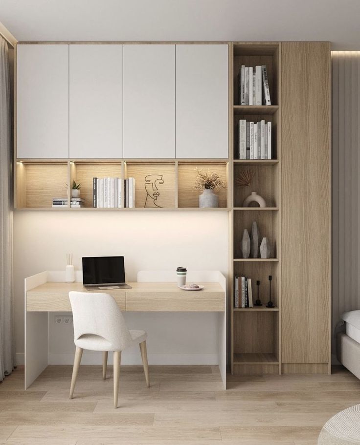 a room with a bed, desk and bookshelf on the wall next to it