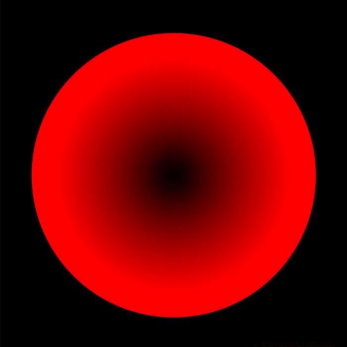 a red circle on a black background