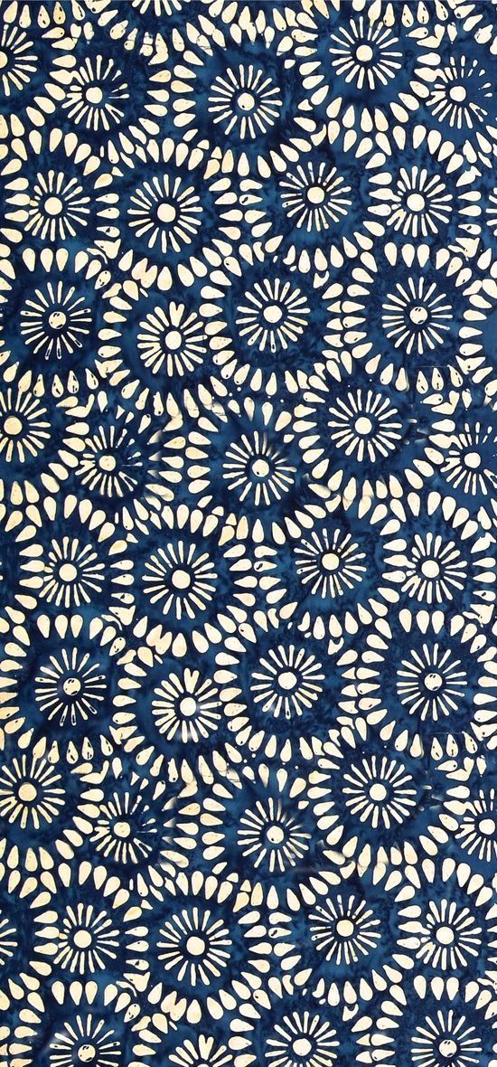 a blue and white pattern on fabric