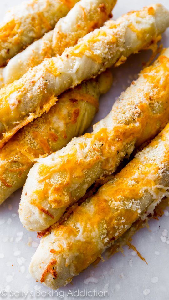 cheesy bread sticks with cheese on top