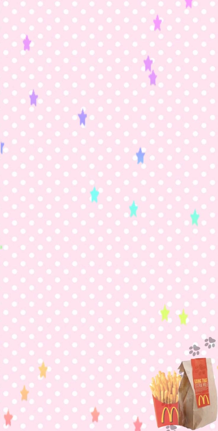 a pink background with stars and french fries