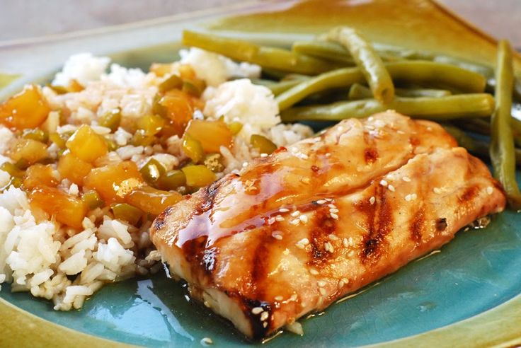 the meal is prepared and ready to be eaten on the plate, including green beans