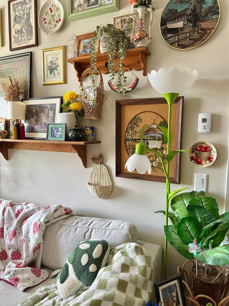 a living room filled with furniture and lots of pictures on the wall above it's head