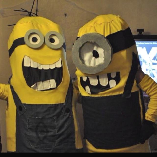 two people in costumes standing next to each other