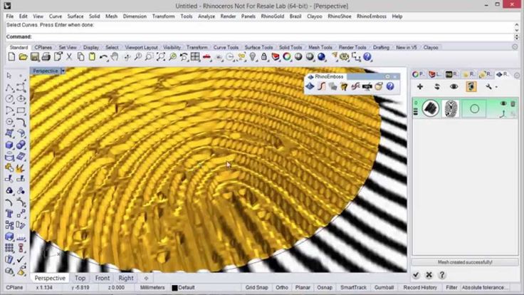 a computer screen with a yellow and black pattern on the bottom right hand corner is an image of a fingerprint