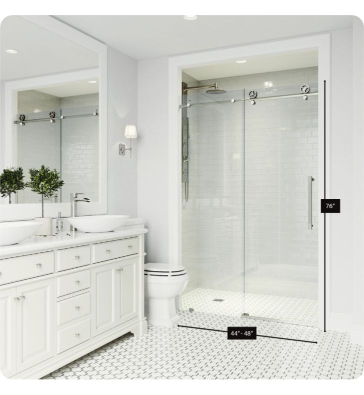 a white bathroom with two sinks and a walk in shower