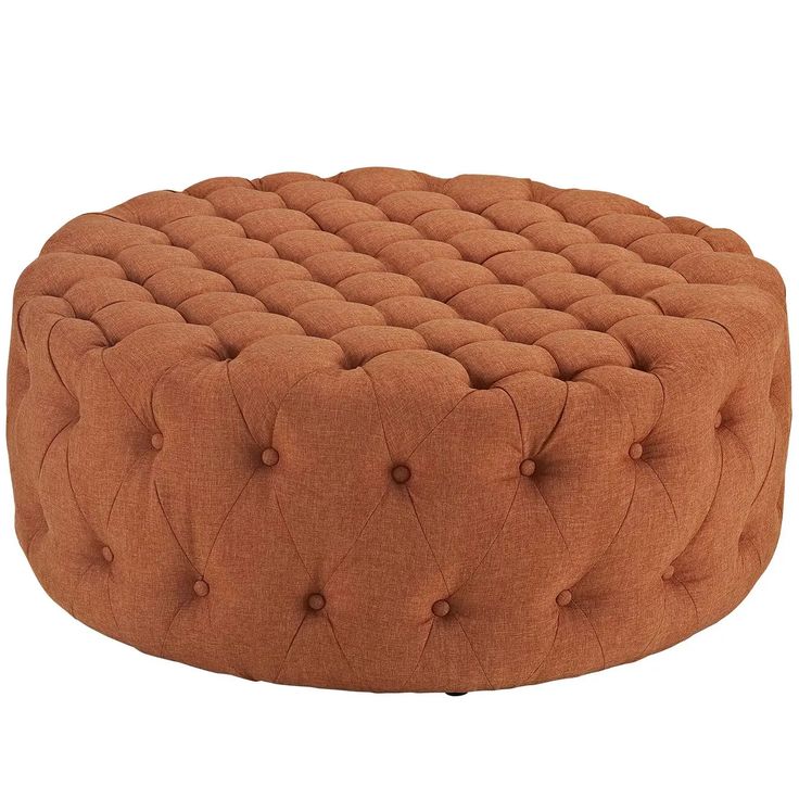 an orange round ottoman with buttons on the front and back legs, sitting on a white background