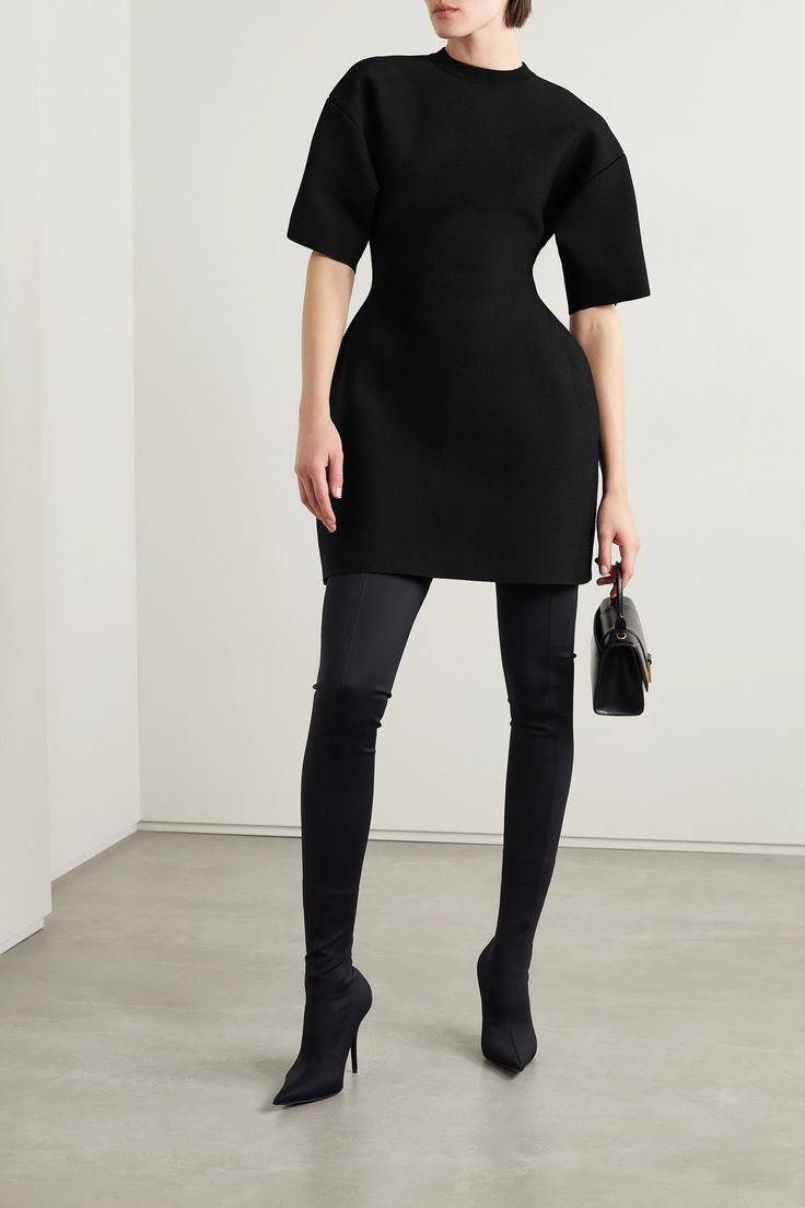 Balenciaga's mini dress is designed in a curvaceous 'Hourglass' shape. Cut from smooth black stretch-ponte, it has a thick handle and dropped shoulder seams. Style yours with matching tights and over-the-knee boots. Balenciaga Tights, Balenciaga Dress, Dresses And Tights, Tight Black Dress, Balenciaga Clothing, Tulle Mini Dress, Black Balenciaga, Balenciaga Women, Balenciaga Black