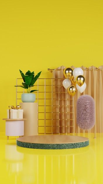 a yellow room with balloons and other decorations