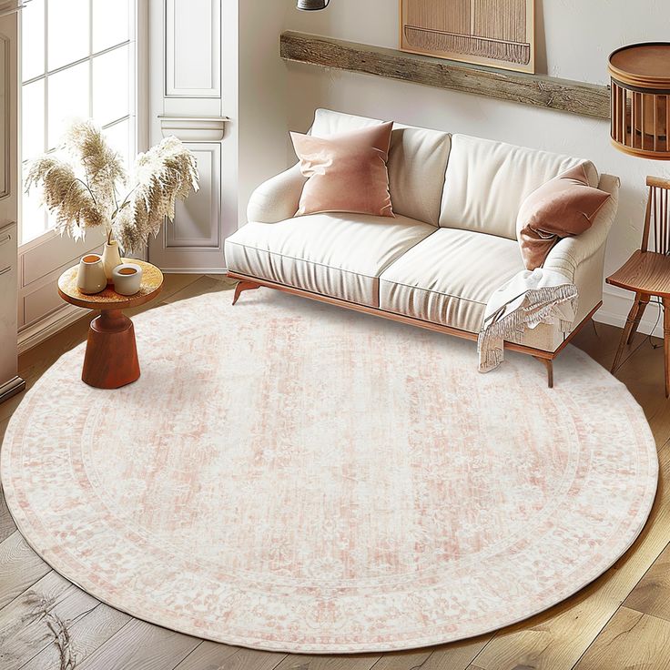 a living room filled with furniture and a round rug on the floor in front of a window