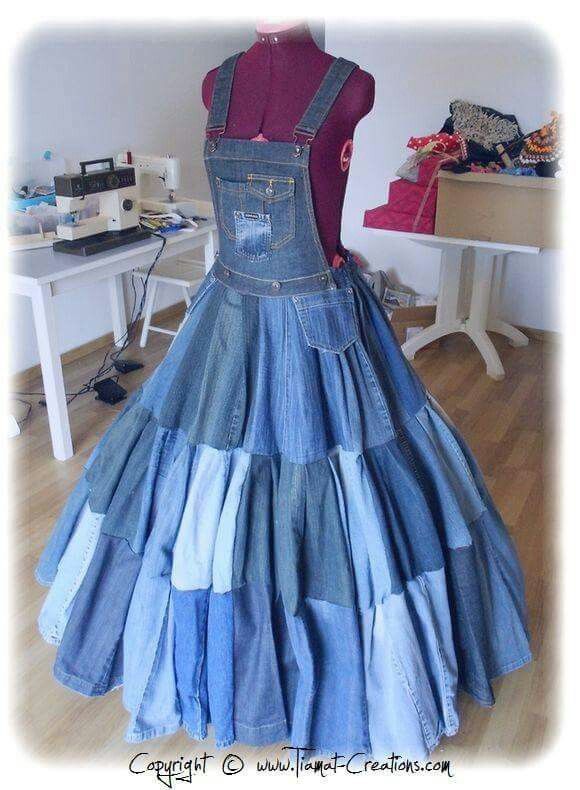 a dress made out of denims and other material on a mannequin's head