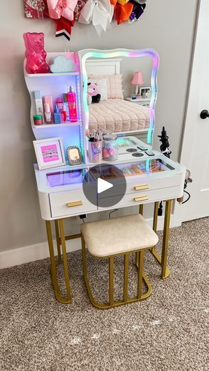 a desk with a mirror and lights on it