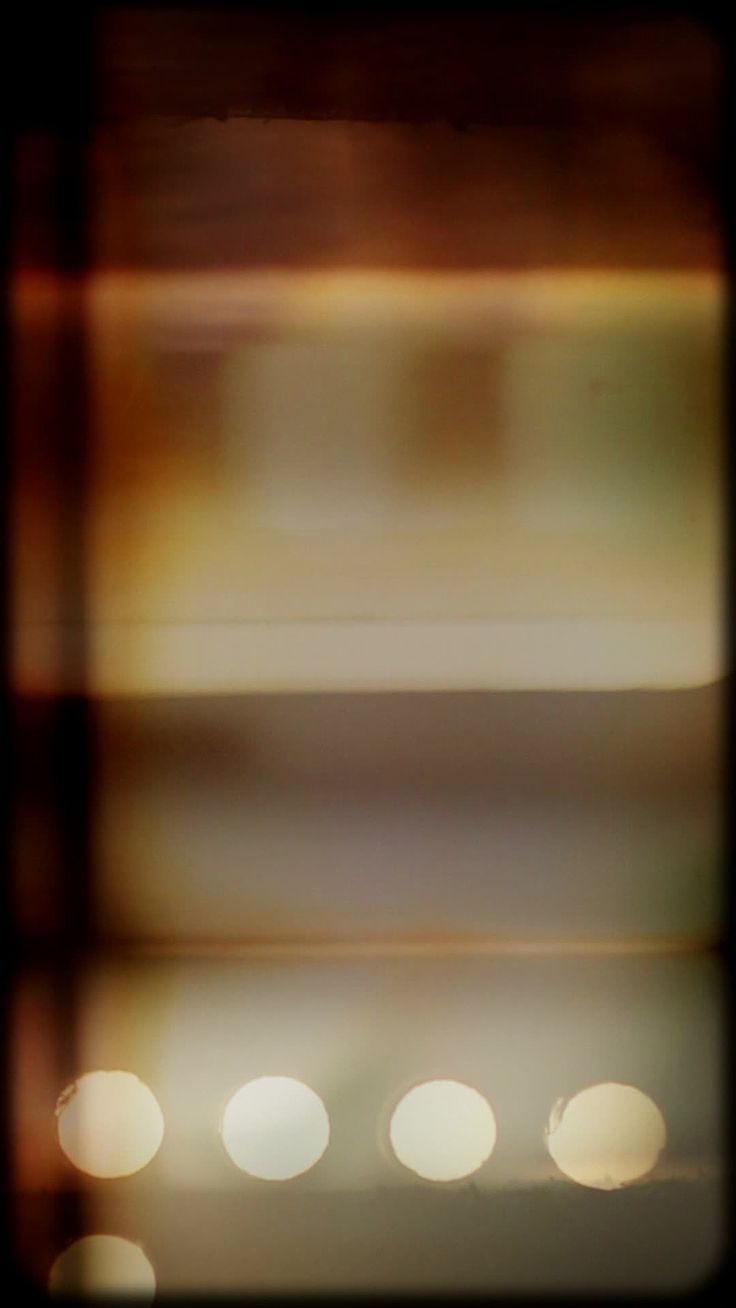 blurry photograph of an oven with lights in the background