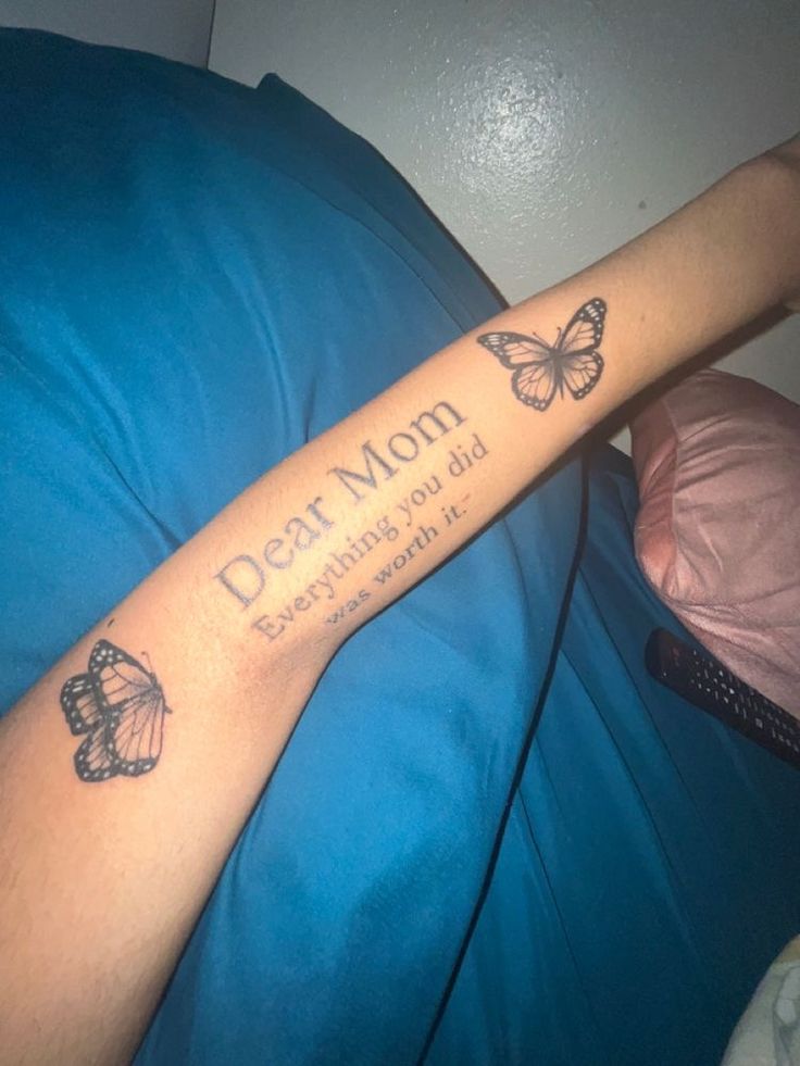 a person with a tattoo on their arm that says, dear mom everything you did