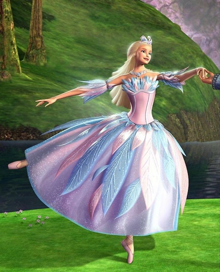 barbie the fairy is dancing in her pink and blue dress