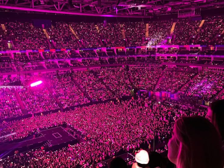 a large stadium filled with lots of people