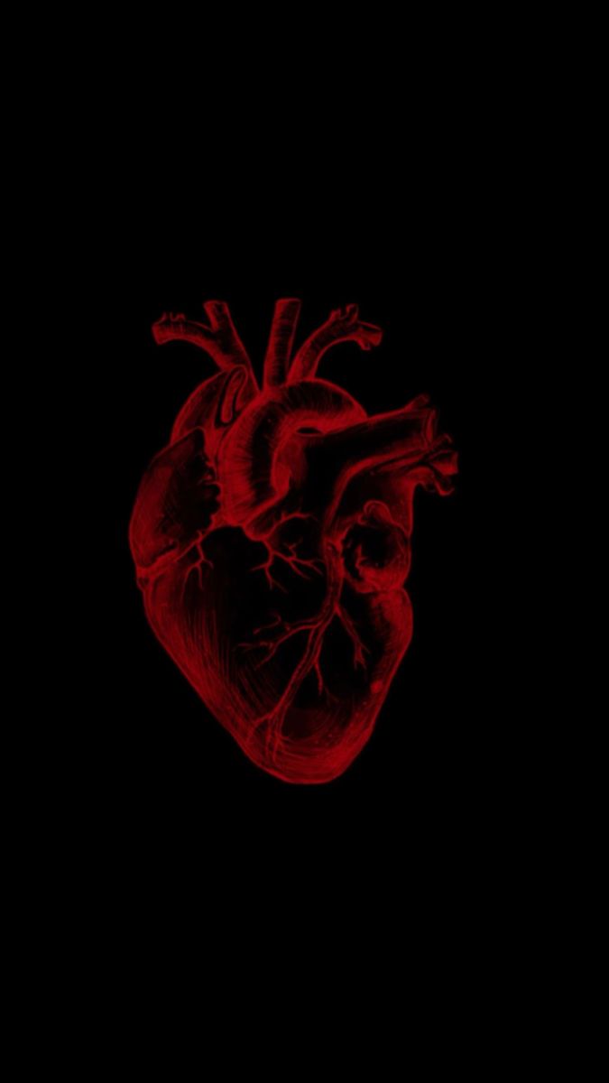 a red heart on a black background