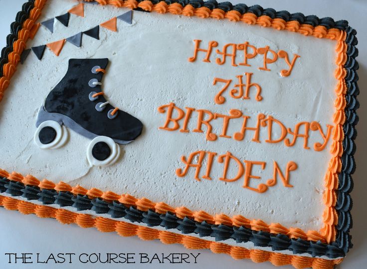 a birthday cake that is decorated with roller skates