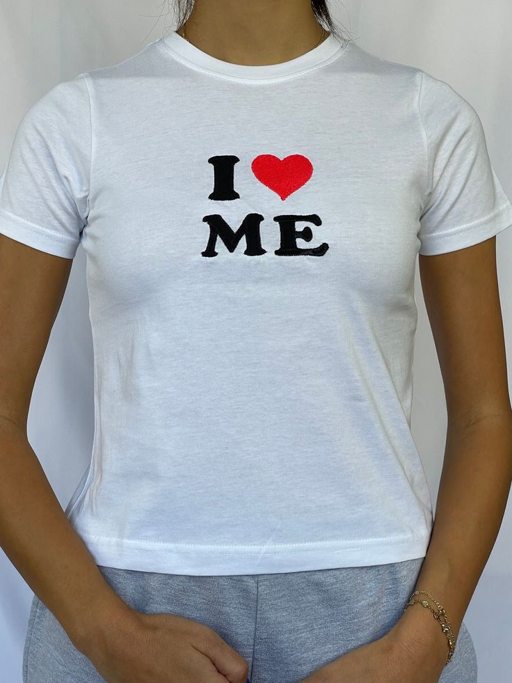 "I heart me baby tee 100% cotton available in sizes xs - xl - see photo 5 for sizing Model is wearing  size S and is a 6/8 - For reference, model is 5'5 with 31\" bust and 26\" waist baby tee with i love / heart me embroidery" Cute Fitted T-shirt With Heart Graphic, Summer Cotton T-shirt With Heart Print, Trendy Cotton T-shirt With Heart Print, Trendy Cotton Tops With Heart Print, Fitted Heart Print T-shirt With Crew Neck, Summer Cotton Top With Heart Print, Cute Cotton T-shirt With Heart Graphic, Fitted Heart Graphic T-shirt, Fitted Graphic Tee With Heart Design