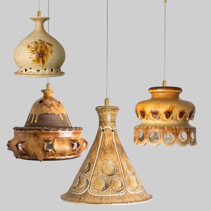 three different types of lamps hanging from strings