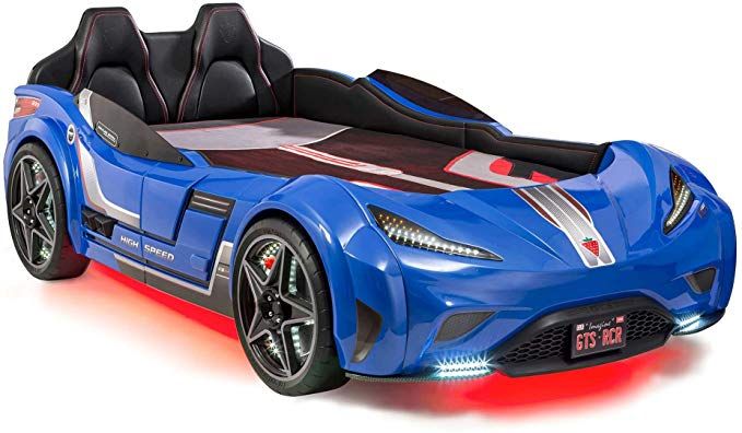 a blue sports car shaped bed with black leather seats and red led lights on the side