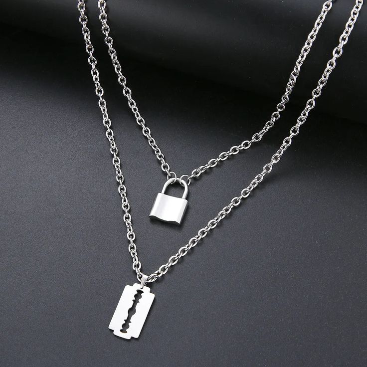 Titanium Double Layer Lock and Blade Pendant Necklace - Premium Necklace from Dazzling Delights - Just $25.50! Shop now at Dazzling Delights Circle Necklaces, Necklace Meaning, Blade Necklace, Pattern Lock, Titanium Metal, Layered Chain, Lock Necklace, Titanium Jewelry, Picture Gifts