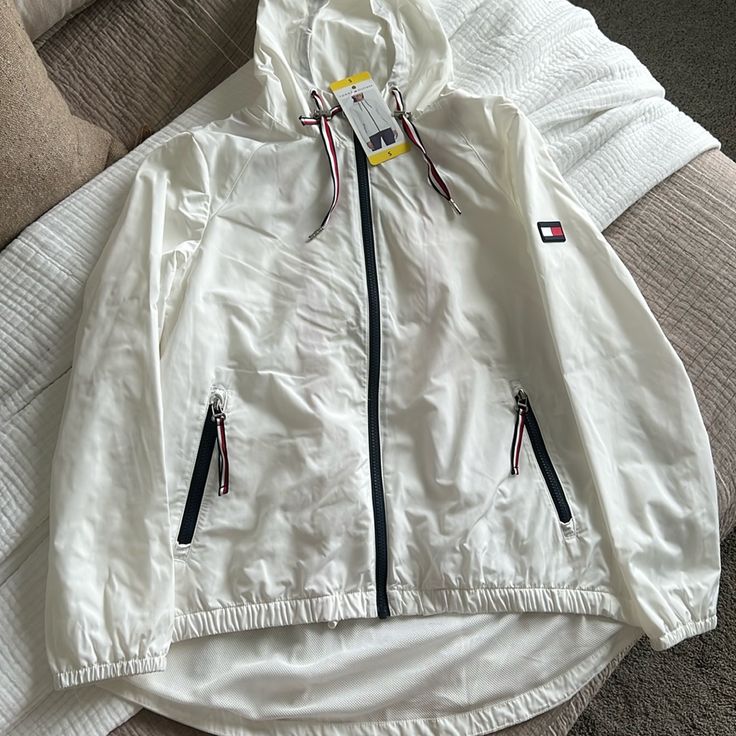 Tommy Hilfiger Casual Outdoor Windbreaker, Tommy Hilfiger Long Sleeve Windbreaker For Winter, Upper Arm Sleeve, Tommy Hilfiger Sporty Streetwear Windbreaker, Tommy Hilfiger Hooded Winter Windbreaker, Sporty Blue Tommy Hilfiger Outerwear, Track Star, Tommy Hilfiger Jackets, Wind Breaker