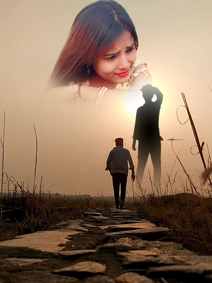 two people walking down a path with the sun in the background and one person holding his hand