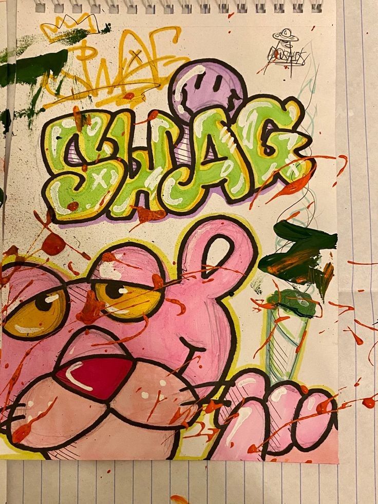 a piece of paper that has been drawn on with colored inks and some type of graffiti