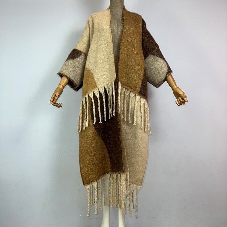 This super soft and warm wool cardigan kimono is perfect for the cold weather. Unlike other sweaters and wools, the wool used for this beauty is non itchy. Think of your favorite throw blanket, the comfort and warmth it gives but 10x stylish and wearable any where. This kimono is all that and more! One size fits S-4X Material: Wool One Size Fits Most Size Chart Wool Kimono, Long Down Coat, Cardigan Kimono, Long Kimono, Kimono Cardigan, Cardigan Fashion, Winter Coats Women, Down Coat, Wool Cardigan