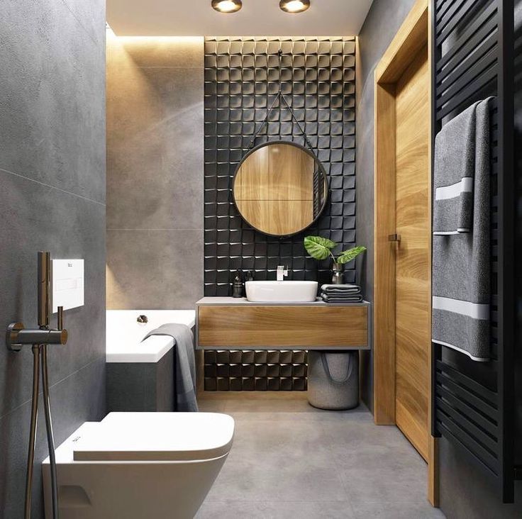 a bathroom with a toilet, sink and bathtub in it's own space