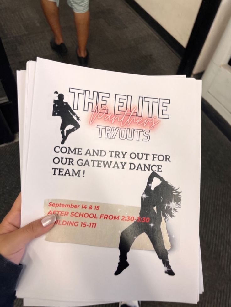 a person holding up a sign with the words the elite tributes tryouts come and try out for our gateway dance