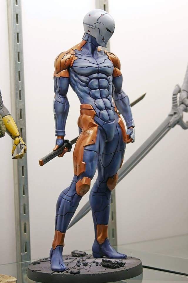 an action figure is displayed on a glass shelf in front of a white wall and two swords