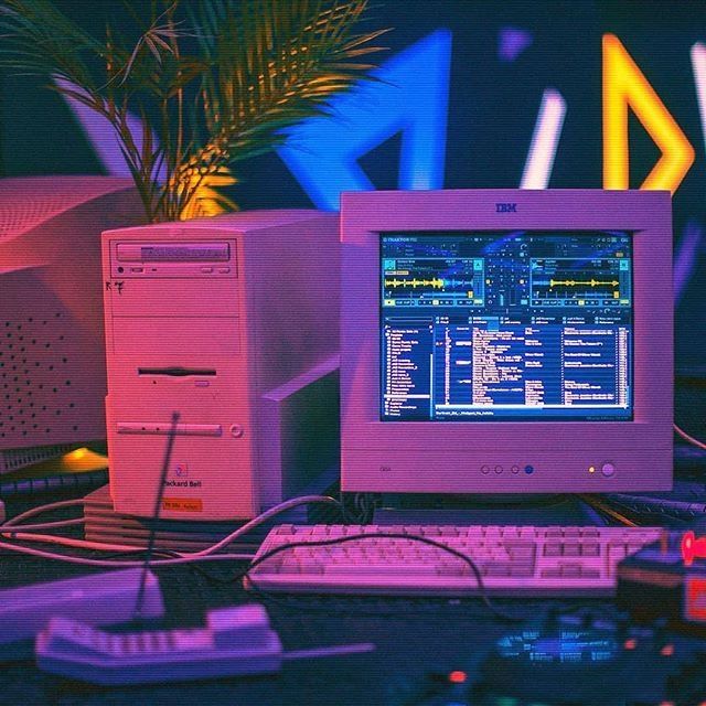 a desktop computer sitting on top of a desk next to a keyboard and monitor,