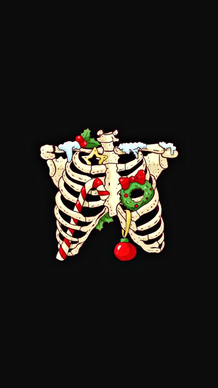 a skeleton pin with an apple on it's chest and the ribcage