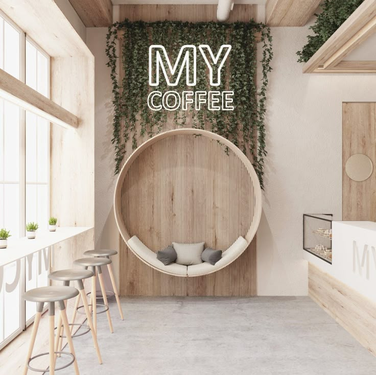 the interior of a coffee shop with plants growing on the wall and round wooden chair