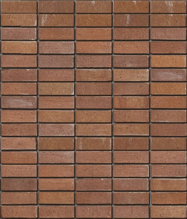 a brick wall that is made out of red bricks