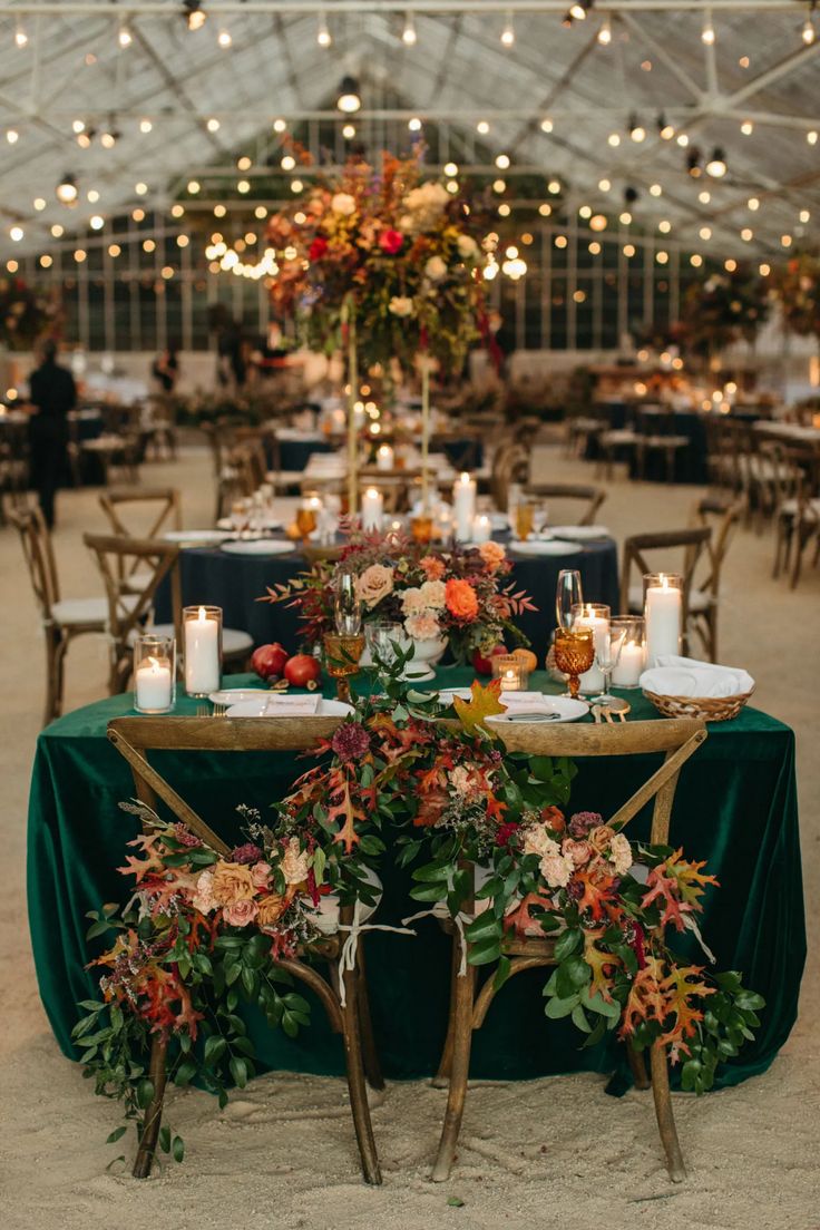 the green wedding shoes website is displayed on an iphone screen, with candles and flowers