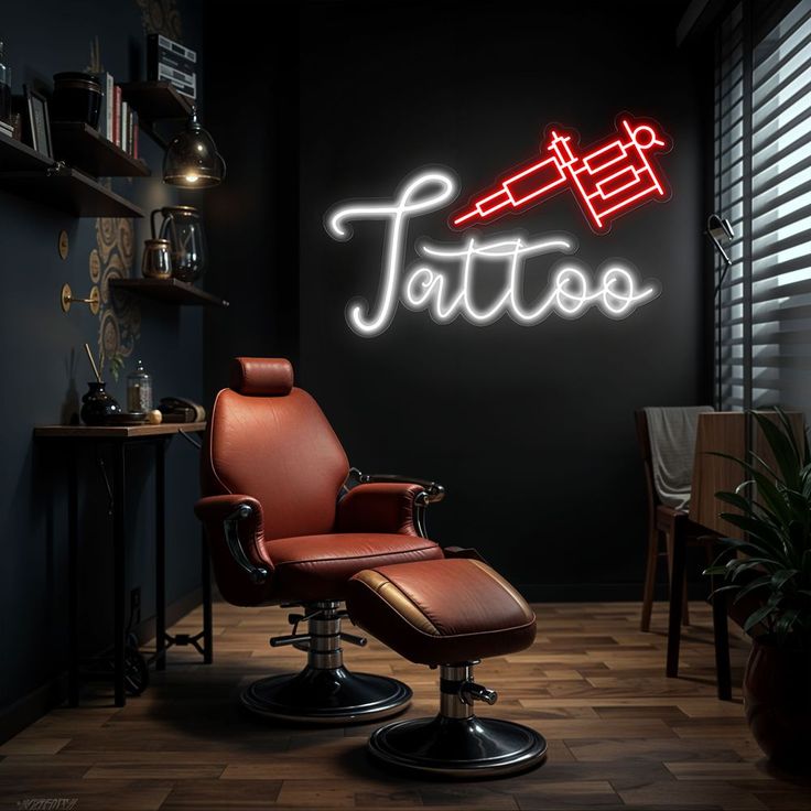 a barber chair sitting in front of a neon tattoo sign