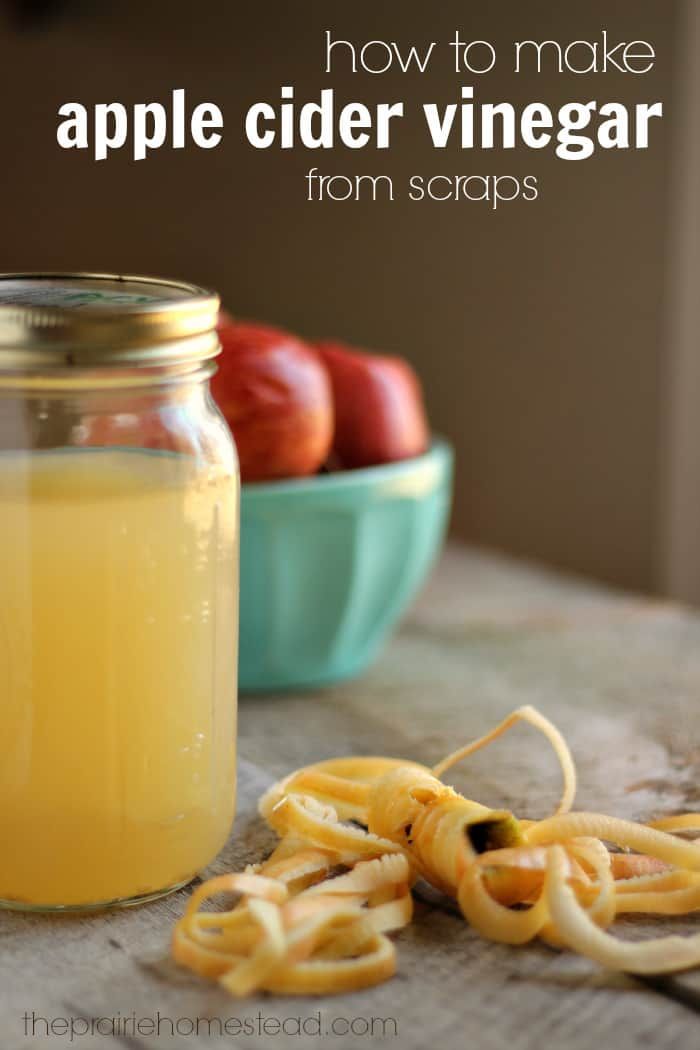 apple cider vinegar from scraps in a mason jar with apples in the background