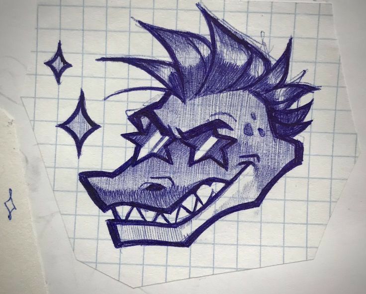 a drawing of a face with spiked hair and an evil grin on it's face