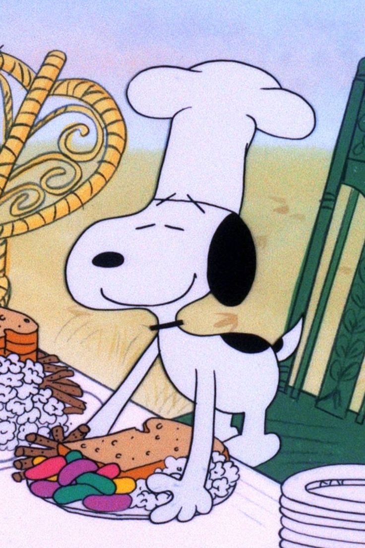 a cartoon dog standing in front of a pile of food