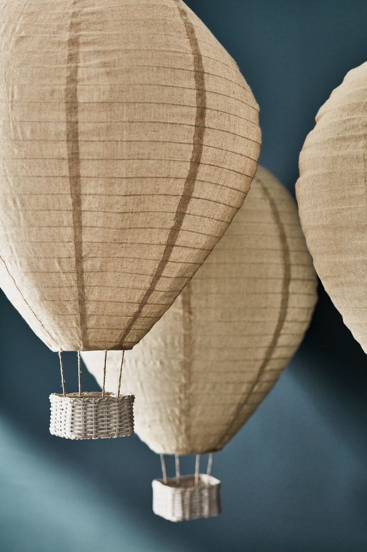 two paper lanterns hanging from the ceiling