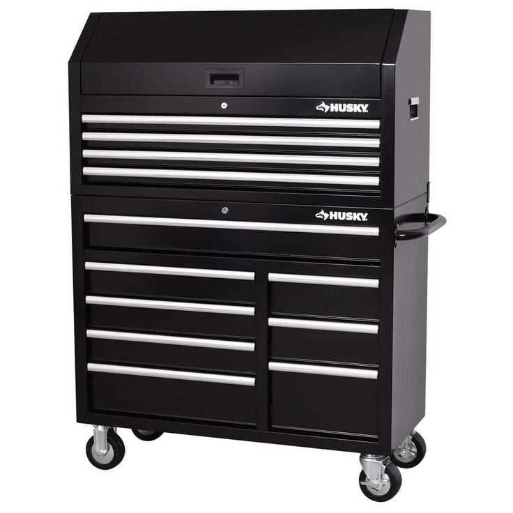 a black tool cabinet with two drawers on wheels and one drawer open to the side