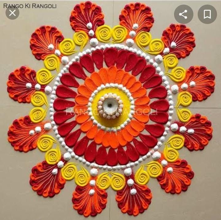 an intricate design on the floor with red, yellow and white colors