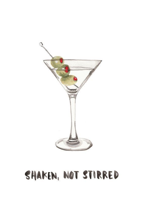 a martini glass with olives in it and the words shaken, not stirred