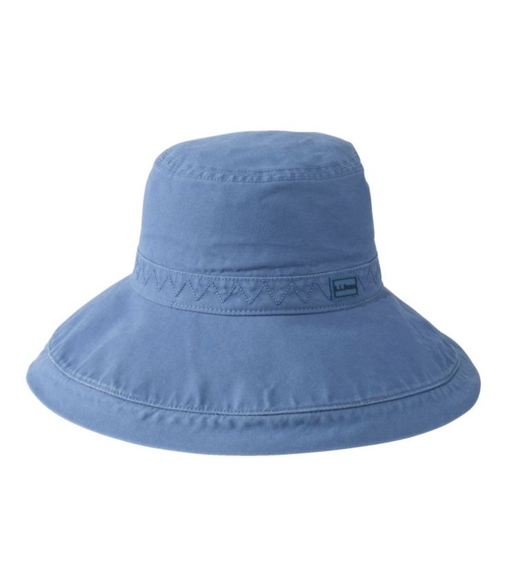 Cute, colorful and lightweight, this wide brim bucket hat will protect you from the sun during all of your time outside. Made from soft, breathable cotton basketweave. Spot clean. Brim is 3. 25" wide. Imported. | Women's Wide Brim Bucket Hat, Cotton Casual Lightweight Hat With Upf 50+, Lightweight Packable Bucket Hat With Curved Brim, Outdoor Cotton Sun Hat With Upf 50+, Casual Lightweight Brimmed Bucket Hat, Lightweight Wide Brim Bucket Hat With Upf 50+, Cotton Beach Sun Hat With Visor, Cotton Visor Sun Hat For The Beach, Cotton Visor Sun Hat For Beach, Lightweight Casual Sun Hat With Curved Brim