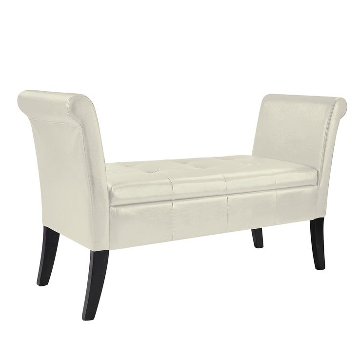 a white leather bench with black legs