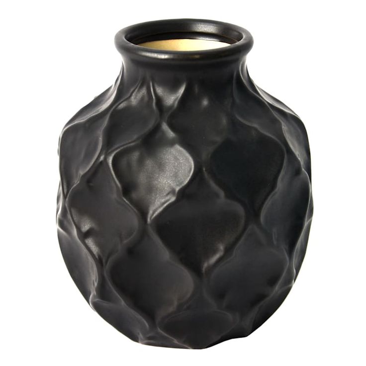 a black vase with wavy designs on the outside and gold in the top corner, against a white background