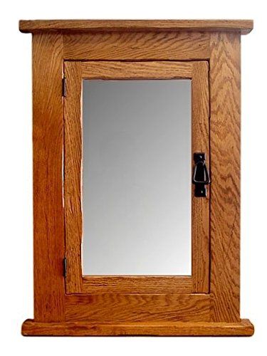 a wooden cabinet with a mirror on it